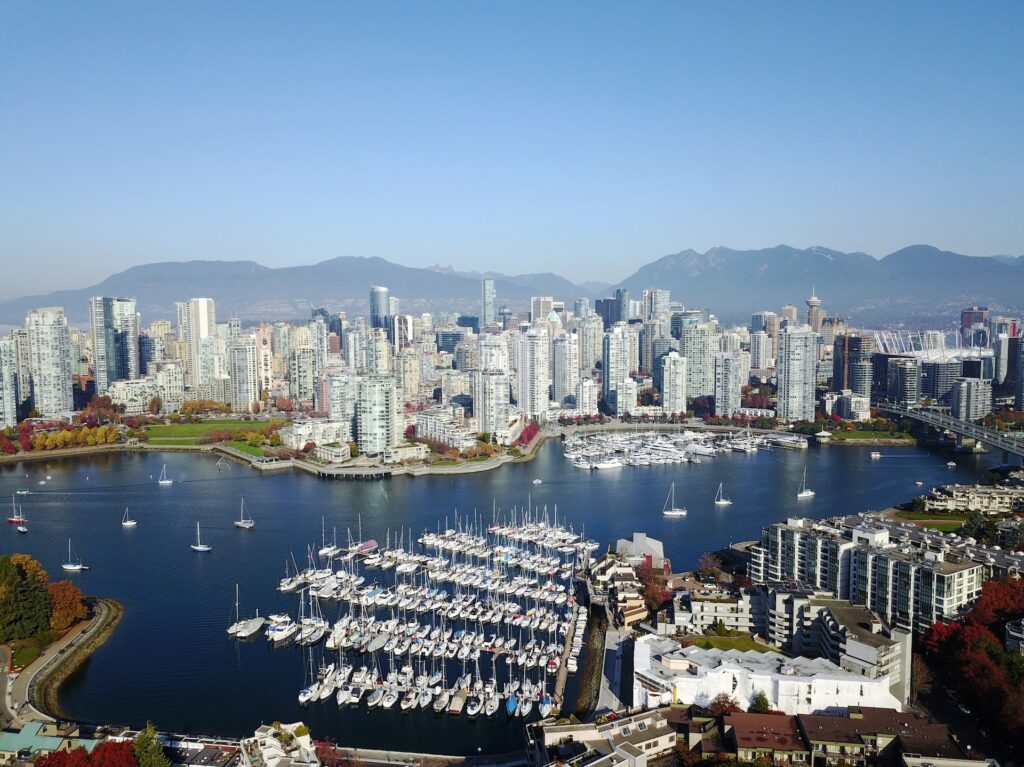 Aerial shot of buildings and the harbor in Vancouver