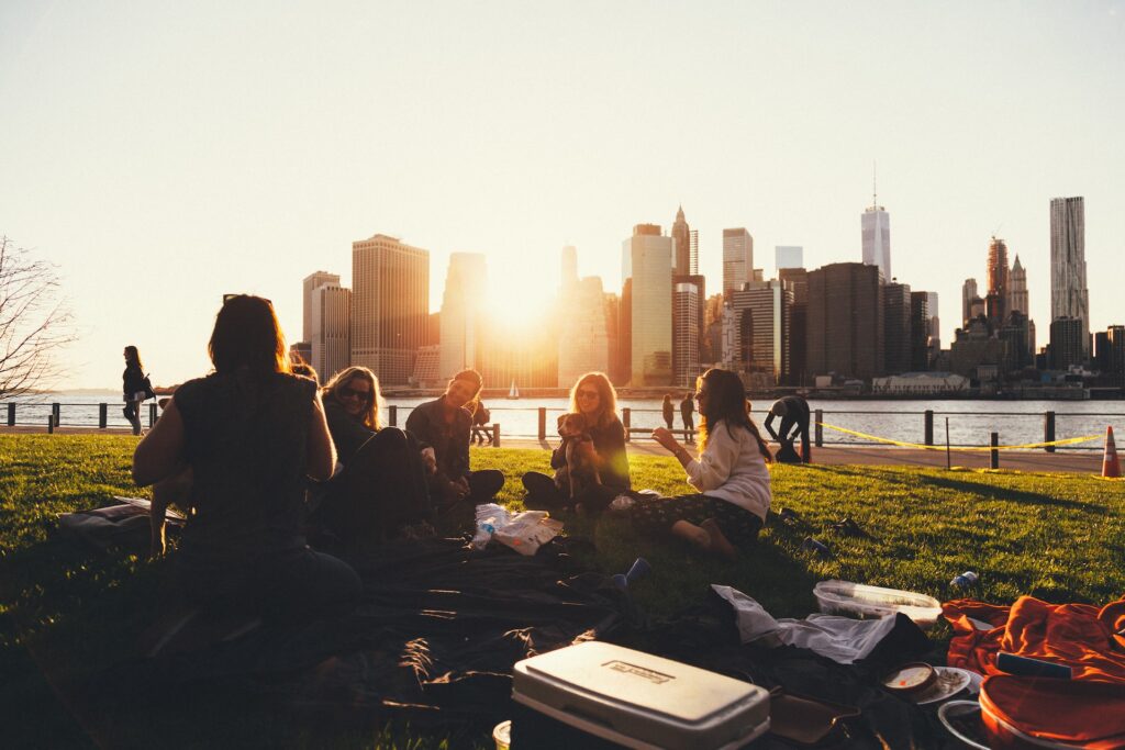 Group of expats having a picnic at the park in NYC