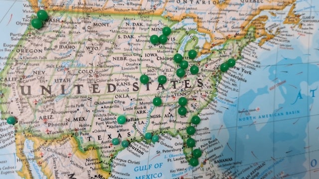 Green pins on a map