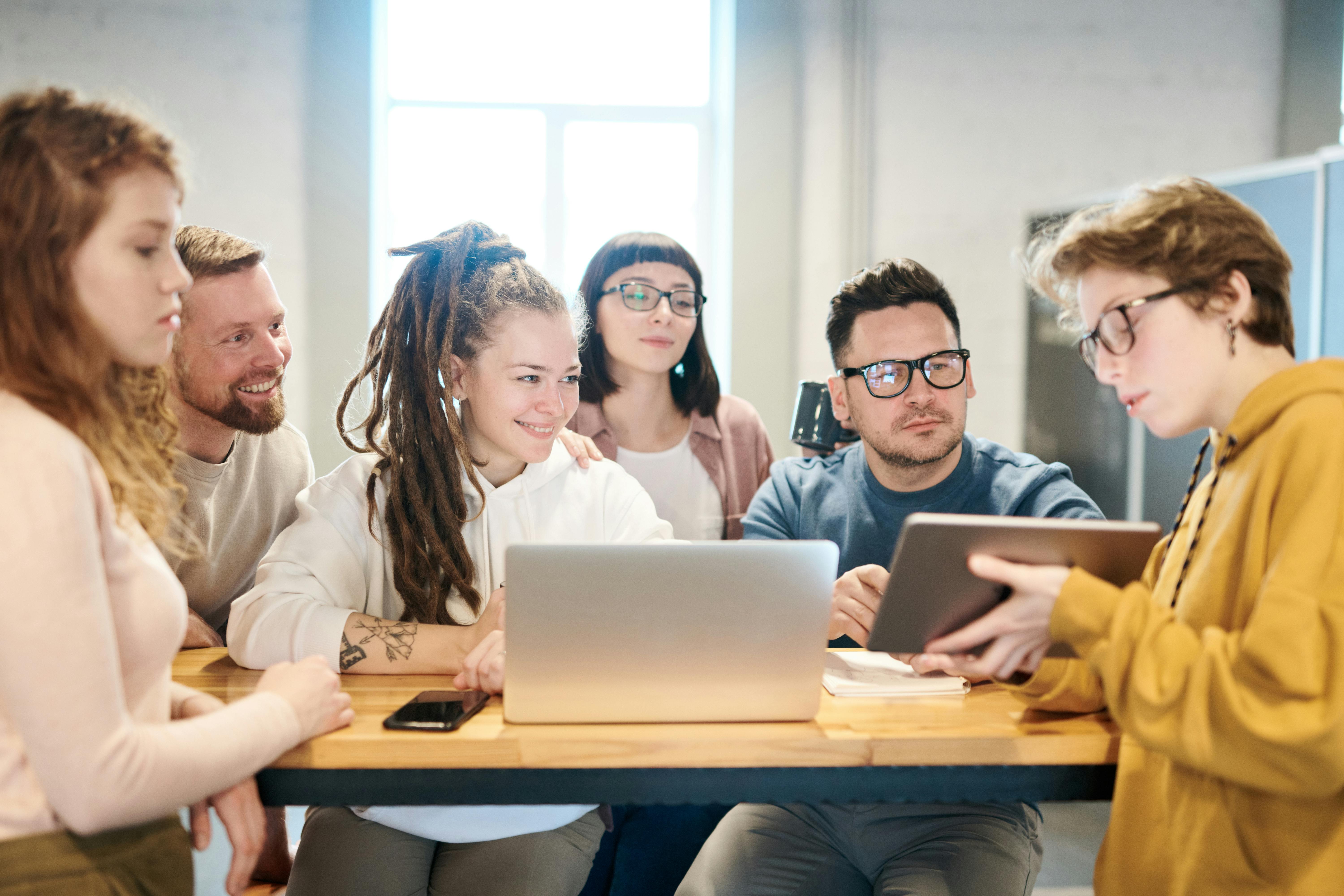 people looking at a tablet