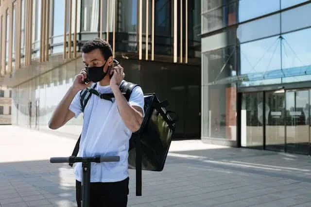  man with a bike and backpack