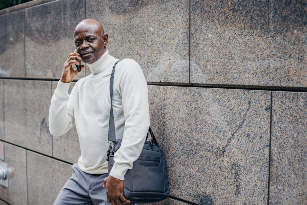 a young professional talking on his phone